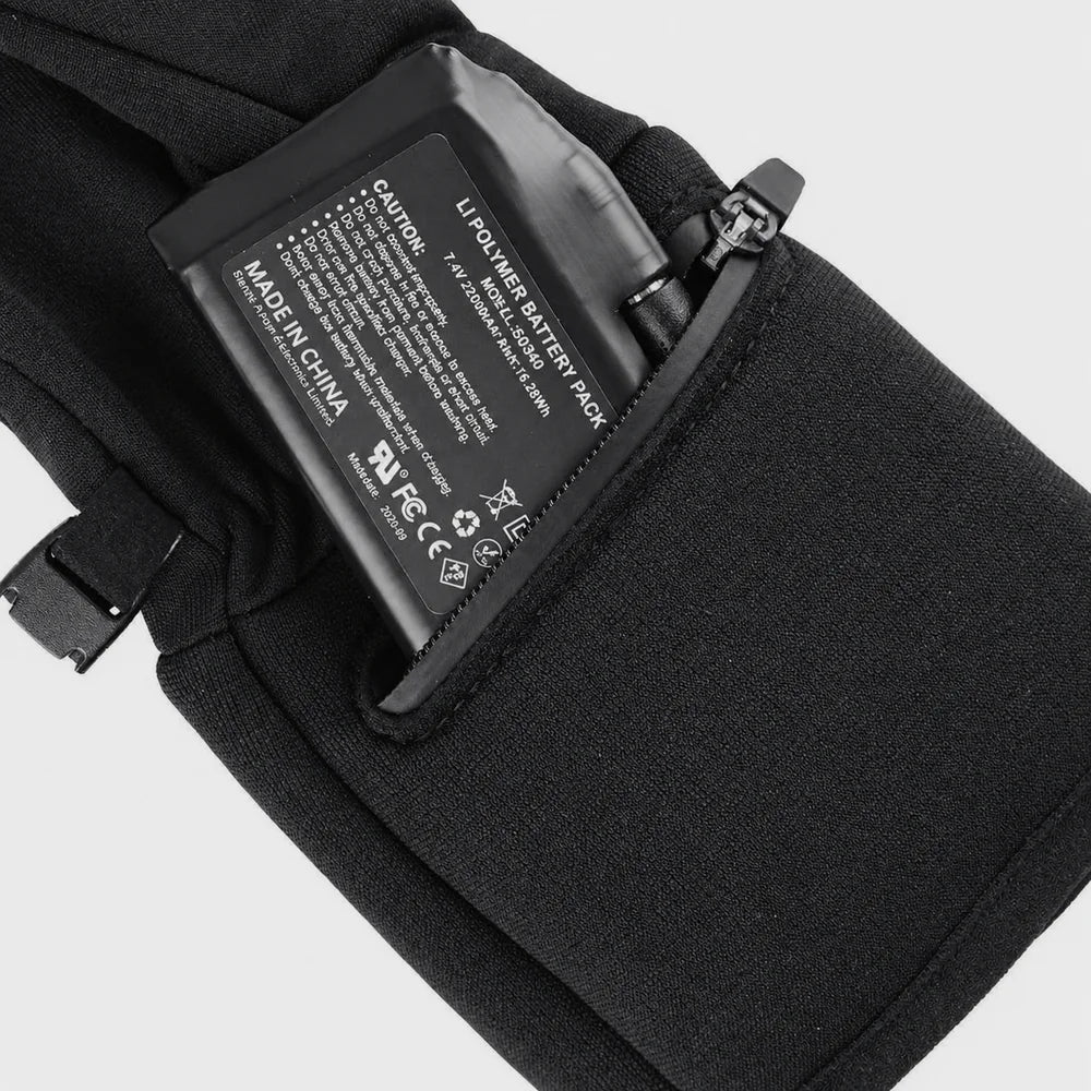 Concealed battery storage pocket on heated glove liners